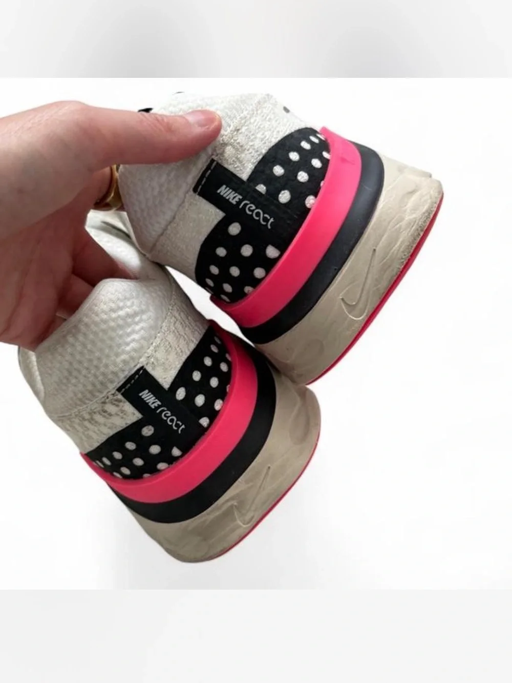 Nike Men’s White Flyknit Running Shoe with Pink Accents